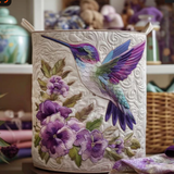 Panier de rangement avec un colibri parmi les fleurs