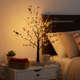 Boom met rode bloemen